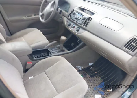 2002 Toyota Camry Le from USA, damaged, VIN 4T1BE32K12U530897